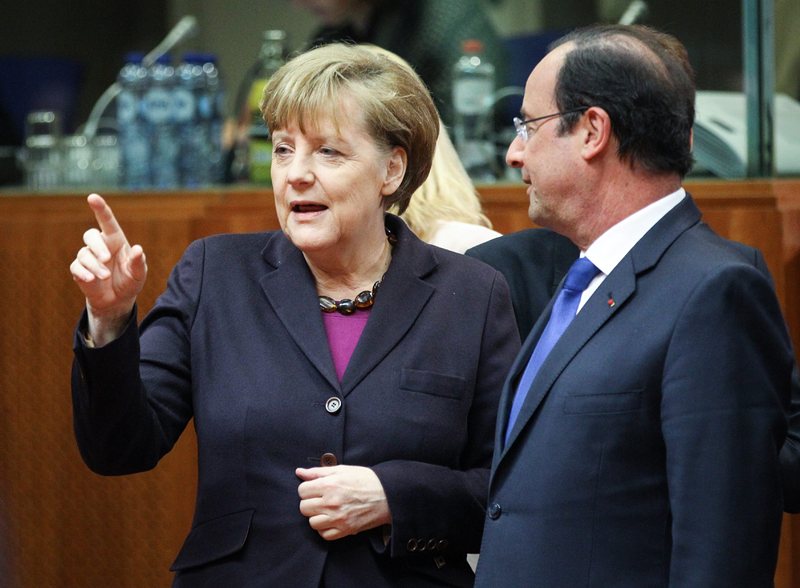 Канцлерът Меркел и френският президент Оланд