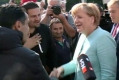 Мигранти аплодираха Меркел в приемен център в Берлин