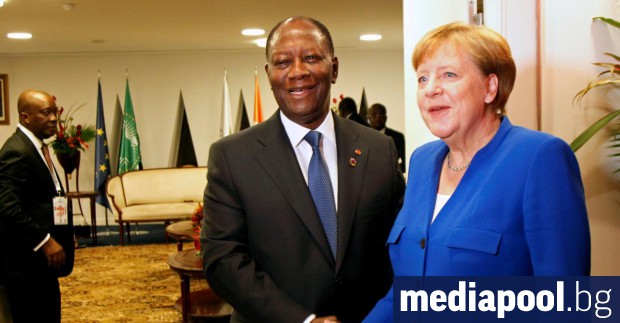 Ангела Меркел с президента на Кот д`Ивоар Аласан Уатара Германският