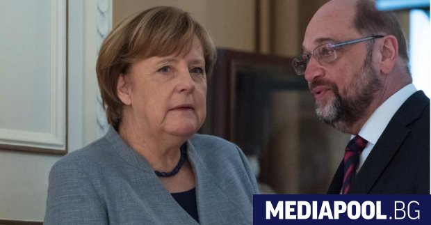 Ангела Меркел и лидерът на ГСДП Мартин Шулц Високопоставени лидери