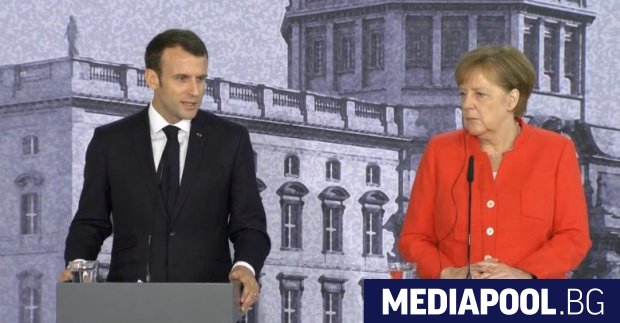 Еманюел Макрон и Ангела Меркел по време на съвместната си