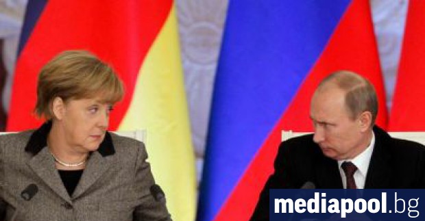 Ангела Меркел и Владимир Путин Германската канцлерка Ангела Меркел каза