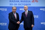 Антониу Гутериш и Владимир Путин по време на срещата им в Казан