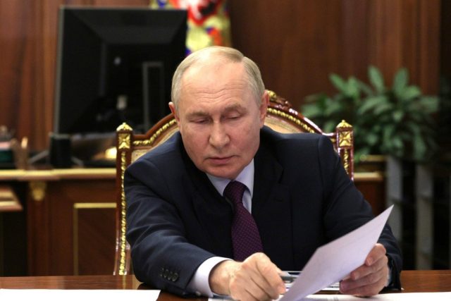 Путин