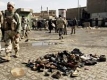 Две бомби убиха 64 души в Багдад