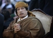 Кадафи отрече да е бягал от Либия, но не е ясно къде е