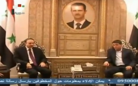Кадър от срещата между Ангелов (вдясно) и председателя на сирийския парламент Мохамад Аллахам.