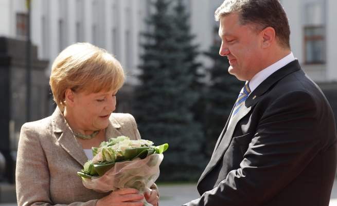 Германският канцлер Ангела Меркел е в Киев за разговори с президента Петро Порошенко преди срещата в Минск за решаване на кризата в Украйна 