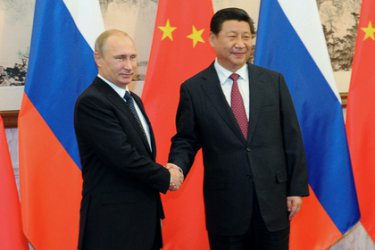 Путин и Цзинпин по време на подписването на новите споразумения