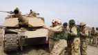 Иракските сили срещу "Ислямска държава" навлязоха в квартал на град Тикрит