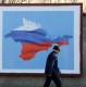 Една година руски Крим: заплатите падат, опашките растат
