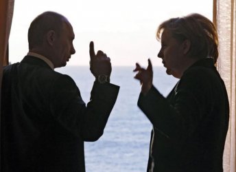 Путин и Меркел.