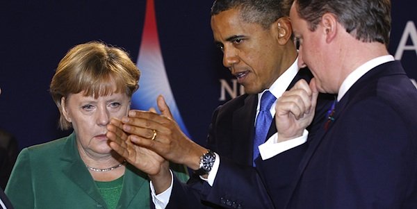 Обама с Меркел и Камерън през март 2014 година