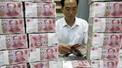 Китай отново поевтини юана спрямо долара