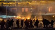 10 ранени и пожар при свада в мигрантски лагер във Франция