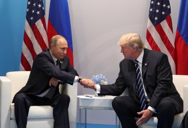 Путин и Тръмп по време на срещата на Г-20, сн. ЕПА/БГНЕС
