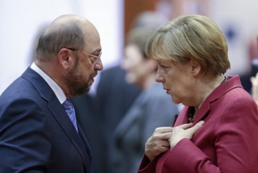 Лидерите на двете партии Мартин Шулц и Ангела Меркел