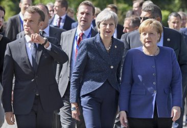 Лидерите на трите държави - Макрон, Мей и Меркел