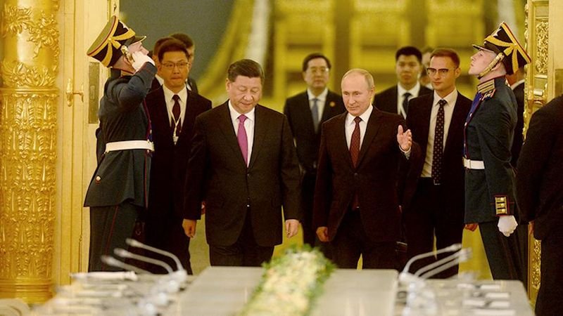 Владимир Путин и Си Цзинпин по време на срещата си в Кремъл в четвъртък