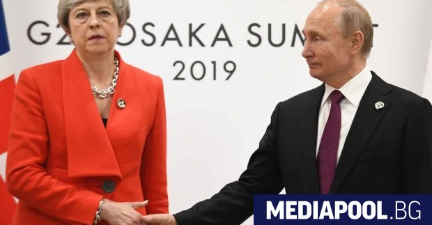 Руският президент Владимир Путин и британският министър председател Тереза Мей се