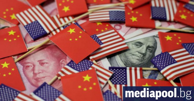 Оставяйки валутата си да се обезцени Китай отвори нов фронт