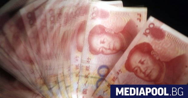Китайската народна банка понижи днес курса на националната валута с