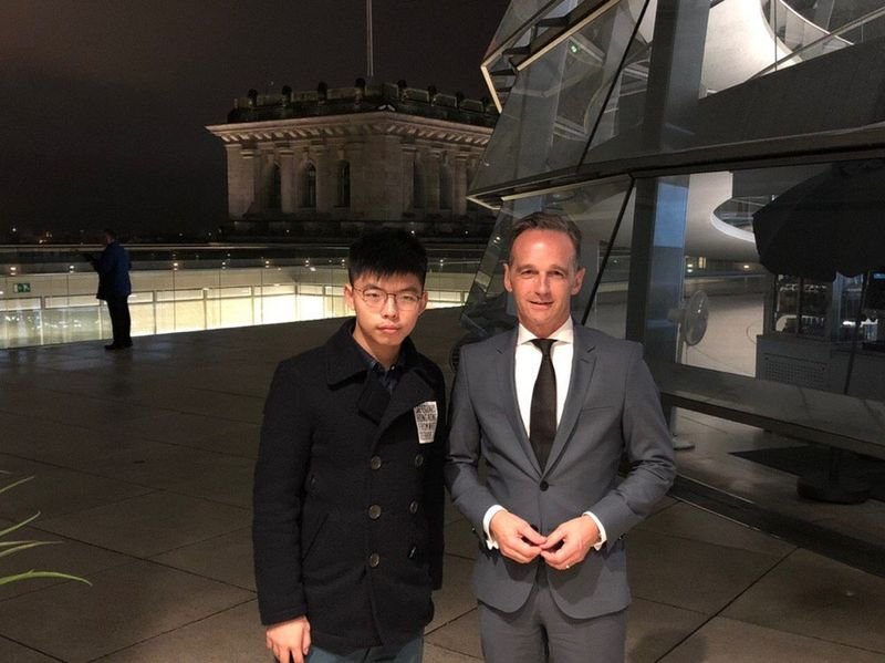 Хонконгският активист Джошуа Уон и германският външен министър Хайко Маас