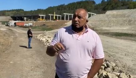 PM Boyko Borissov speaking to reporter at the construction site of Hemus highway