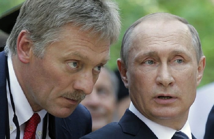 Дмитрий Песков (ляво) и Владимир Путин