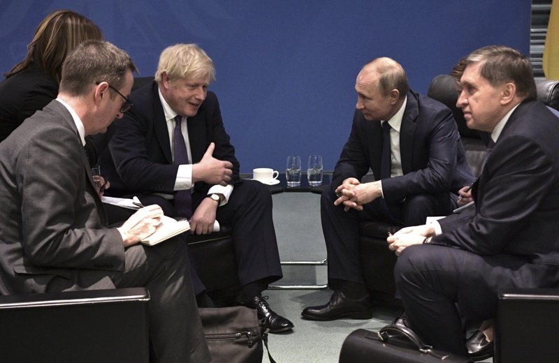Джонсън и Путин разговарят през януари на конференция в Берлин, сн. ЕПА/БГНЕС