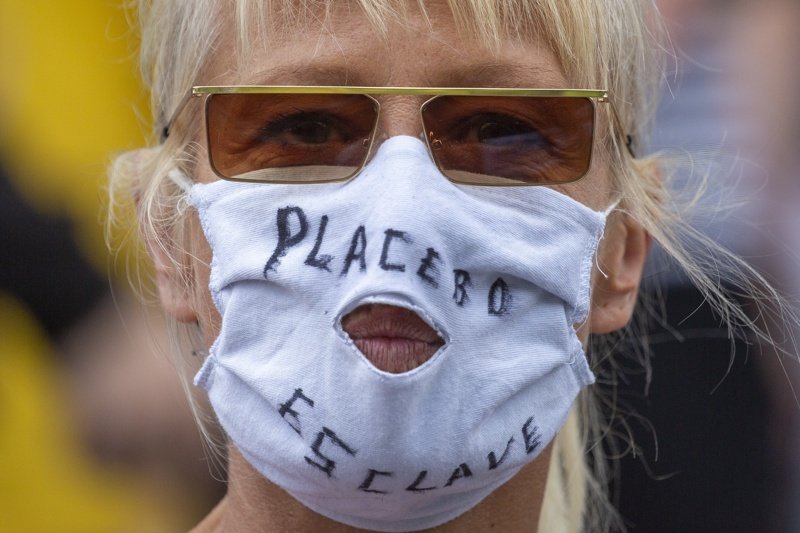 Демонстрантка в Белгия. Снимка: ЕПА/БГНЕС