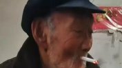 Китайски столетник отдава дълголетието си на алкохола и цигарите