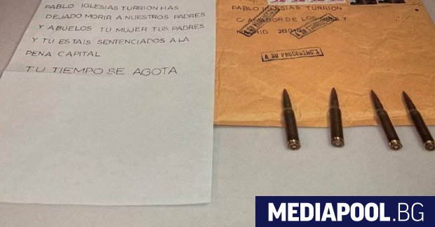 Испанският вътрешен министър Фернандо Гранде Марласка и лидерът на лявата партия