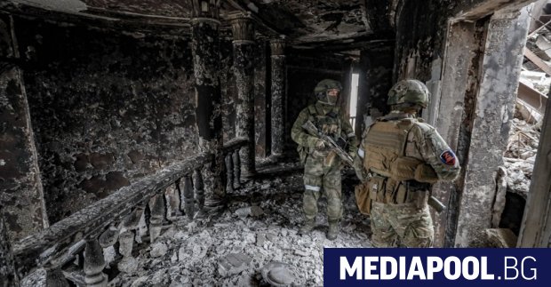 Ден след като определи действията на руските сили в Украйна