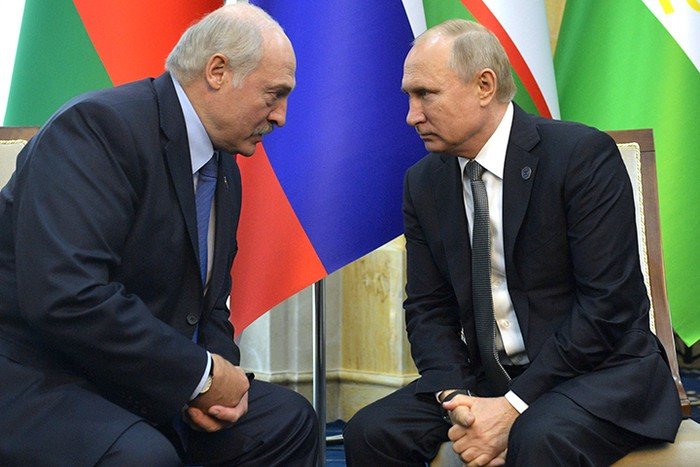 Лукашенко (ляво) с руския президент Путин